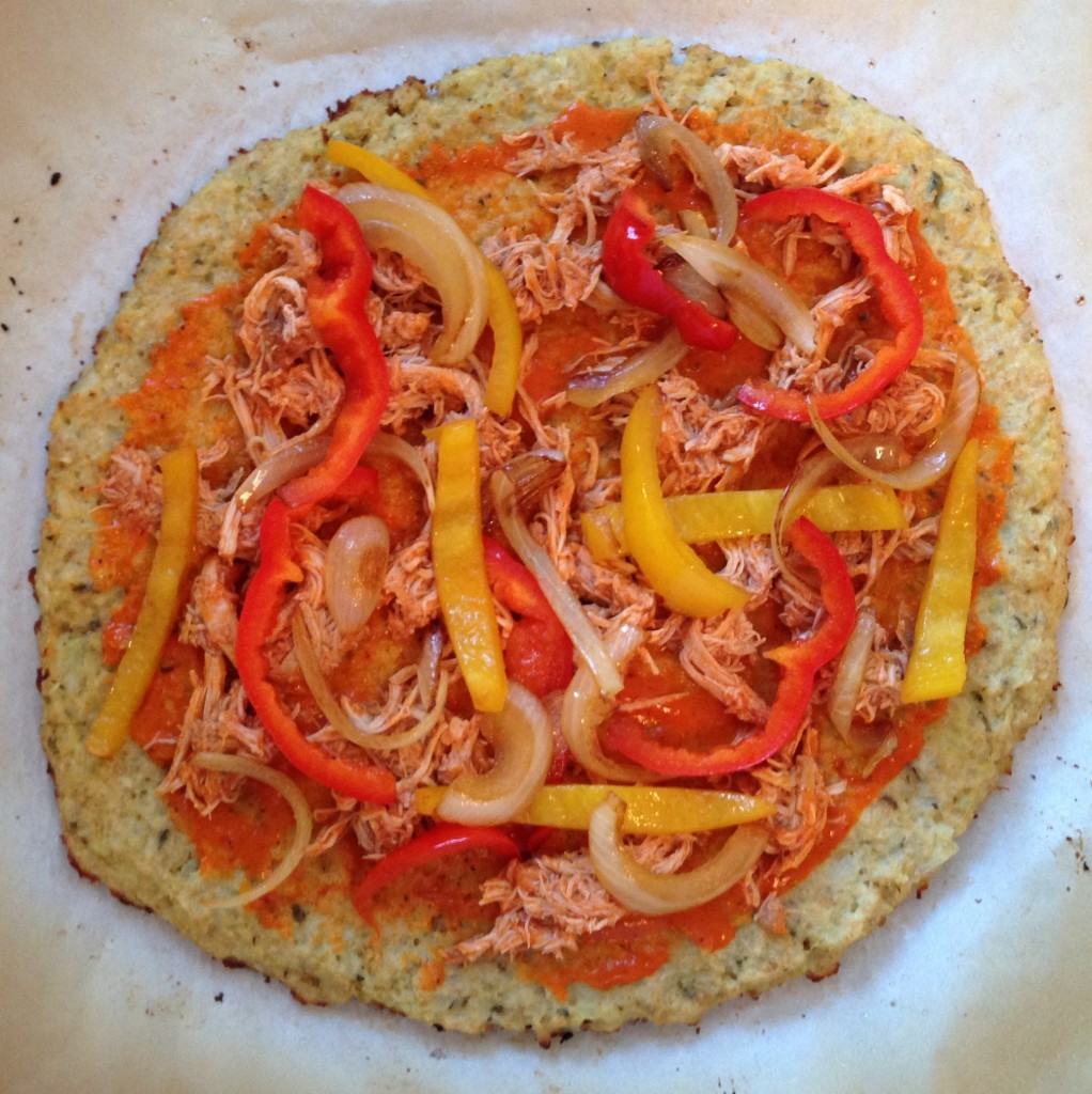 Cauliflower Pizza Crust - guesswhoscooking.com. dairy free, gluten free (option), low carb