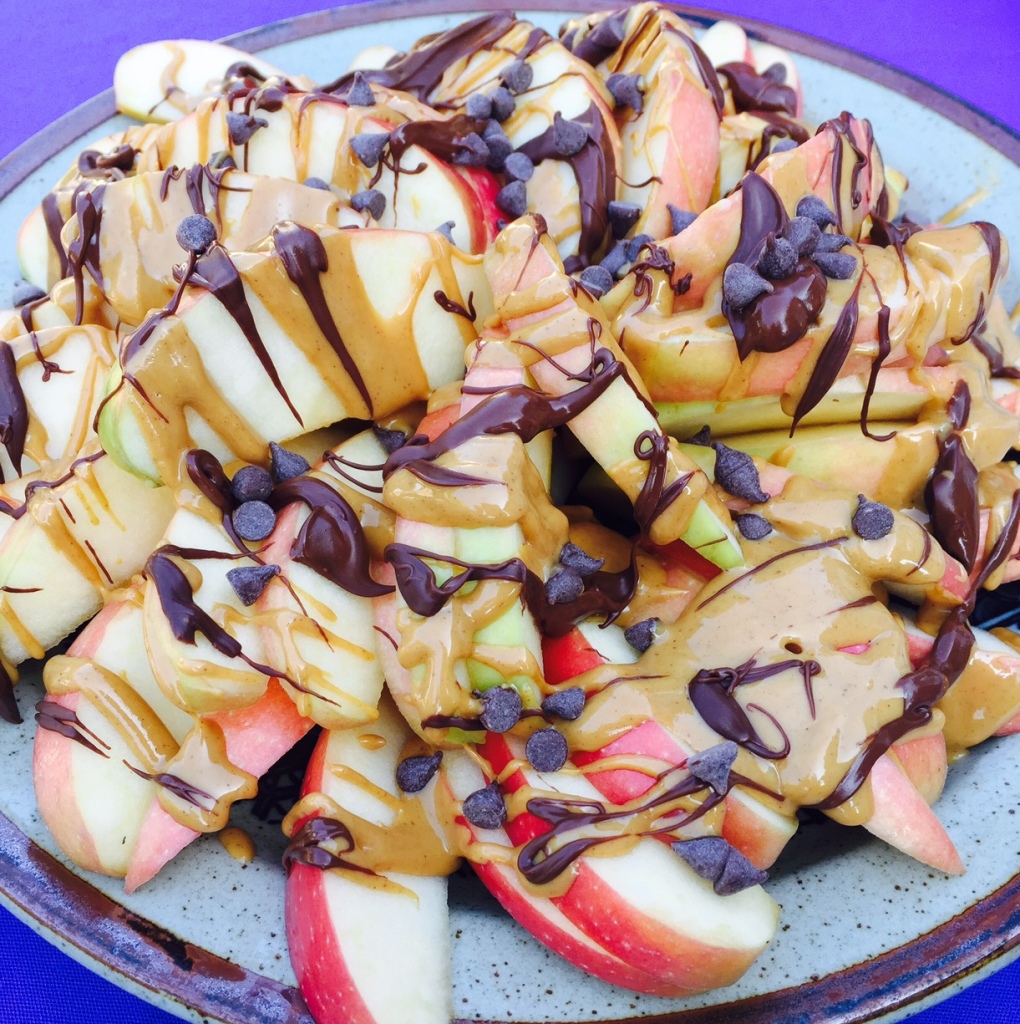 apple slices with chocolate and peanut butter drizzle