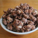 Poppy Chow (chocolate peanut butter popcorn) | GuessWhosCooking.com | Less calories, carbohydates, and sugar, gluten free, egg free, can be made vegan and dairy free