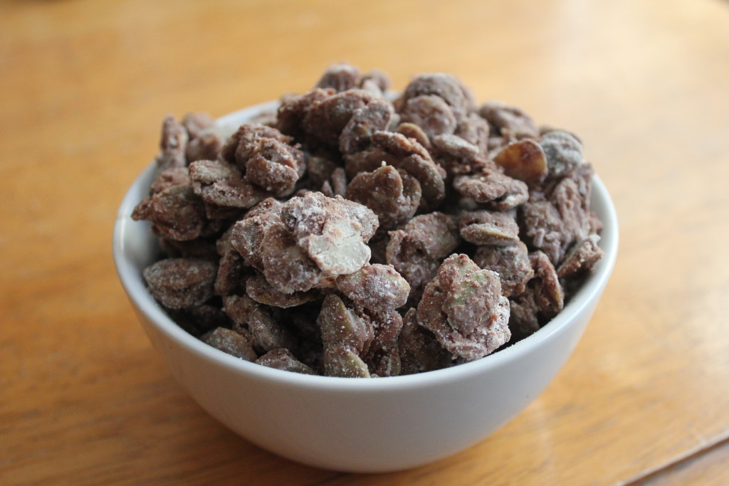 Puppy Chow Flavored Pumpkin Seeds (chocolate and peanut butter) | GuessWhosCooking.com | Less carbohydates and sugar, gluten free, egg free, can be made vegan and dairy free