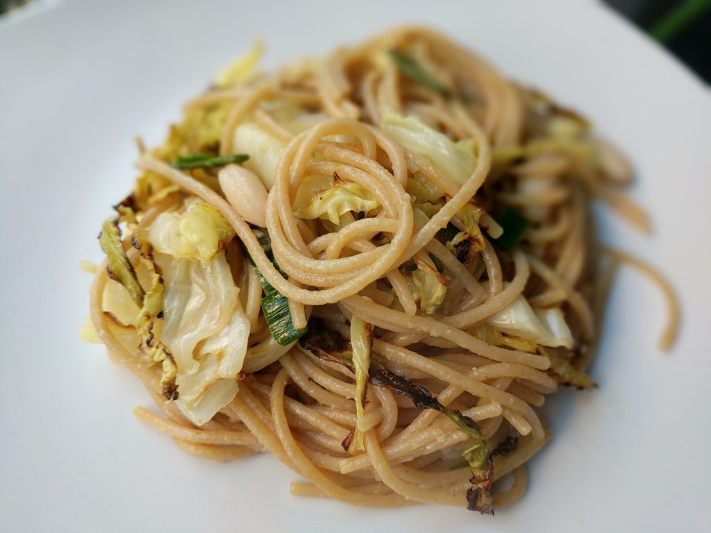 spaghetti, roasted cabbage, and white beans